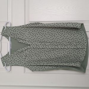 Mint green Henley top, with black polka dots, and silver accents